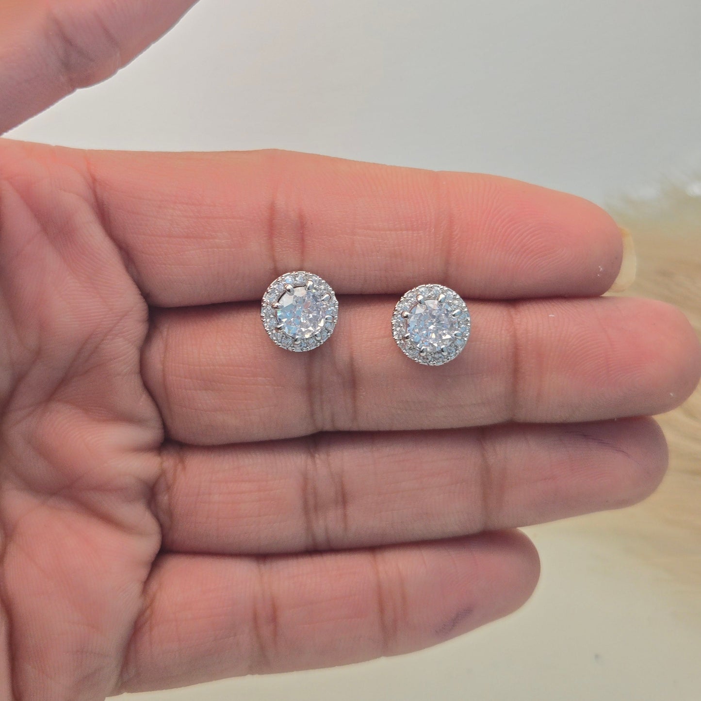 Elegant diamond halo stud earrings