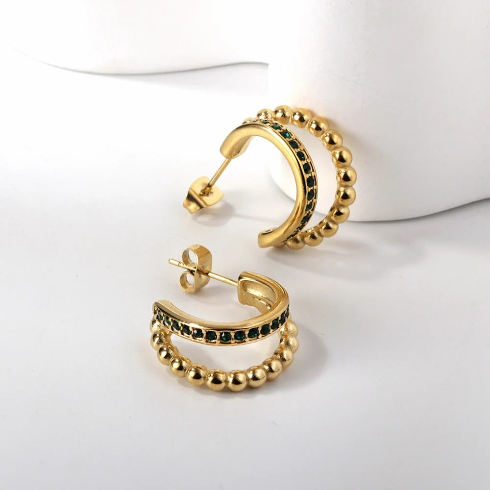 Trendy golden beaded hoop earrings with green stone studded design, elegant lightweight jewelry for women’s festive and daily wear.