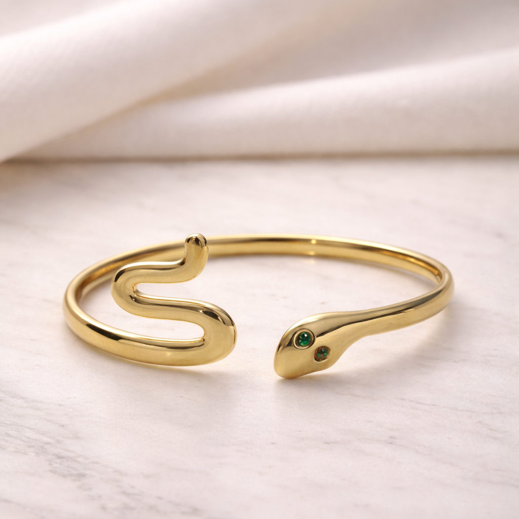 The Cleopatra Emerald-Eye Serpent Gold Cuff Bracelet