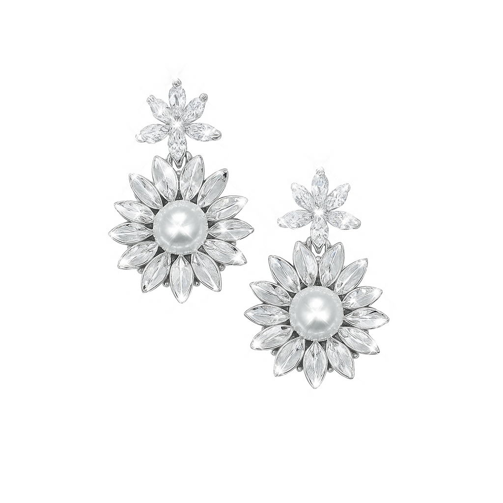 Silver floral earrings with pearls on a white background