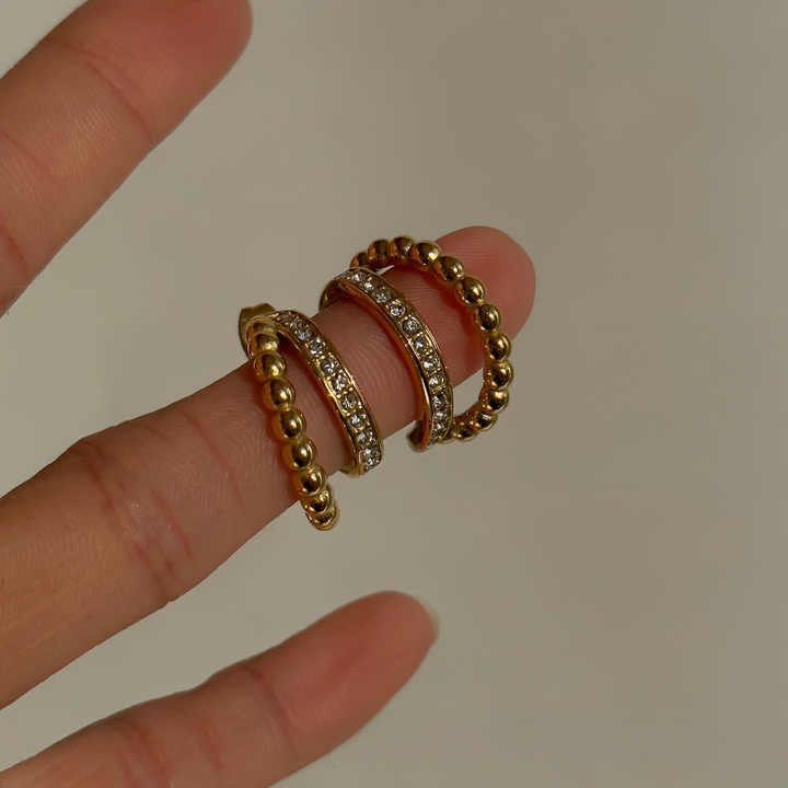 Double-layer gold bead earrings with diamond studs. Made with 18k gold plated, waterproof stainless steel.