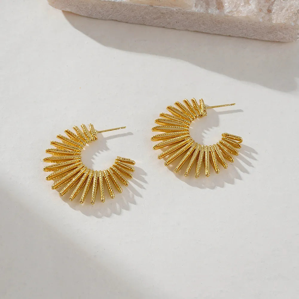 Gold plated sunburst hoop earrings for women, elegant textured design statement jewellery perfect for parties and everyday wear