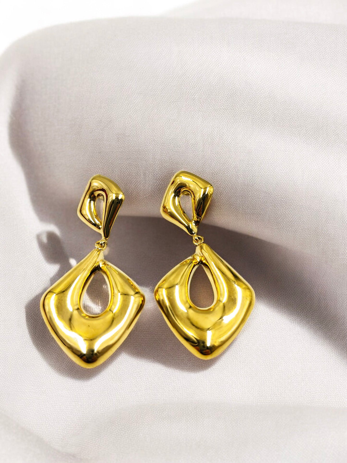 Elegant gold geometric statement earrings for women, anti-tarnish lightweight jewelry perfect for weddings, parties and gifting.