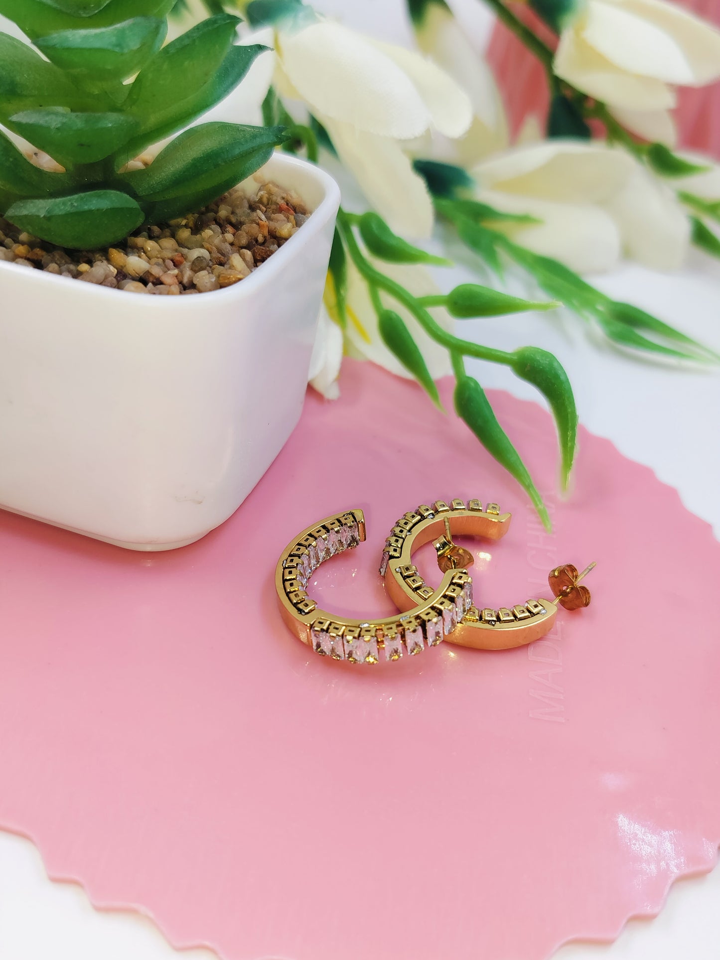 Trendy gold hoop earrings with sparkling stone embellishments, perfect lightweight jewelry for daily wear and party style.