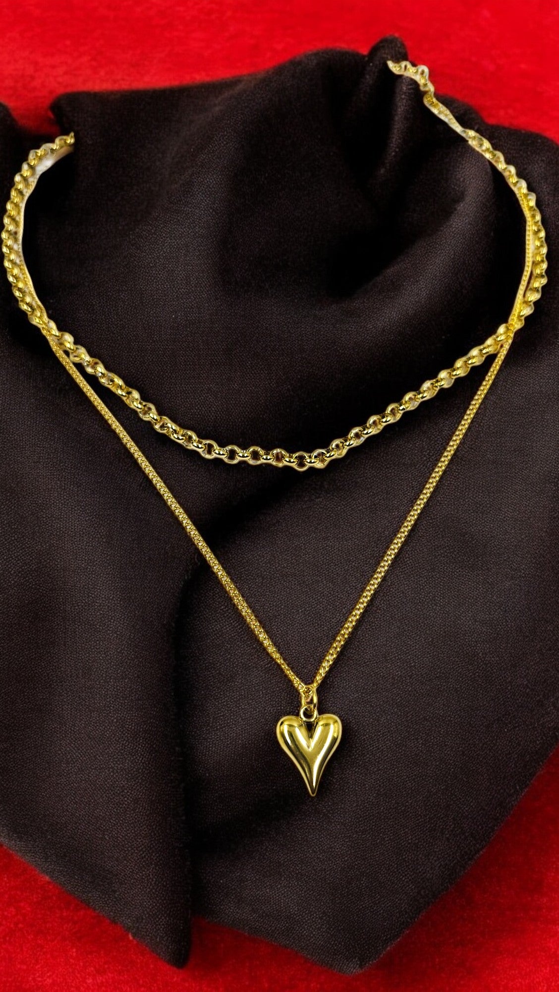 Elegant gold plated layered necklace with heart pendant, chic statement jewelry for women ideal for festive and daily wear.