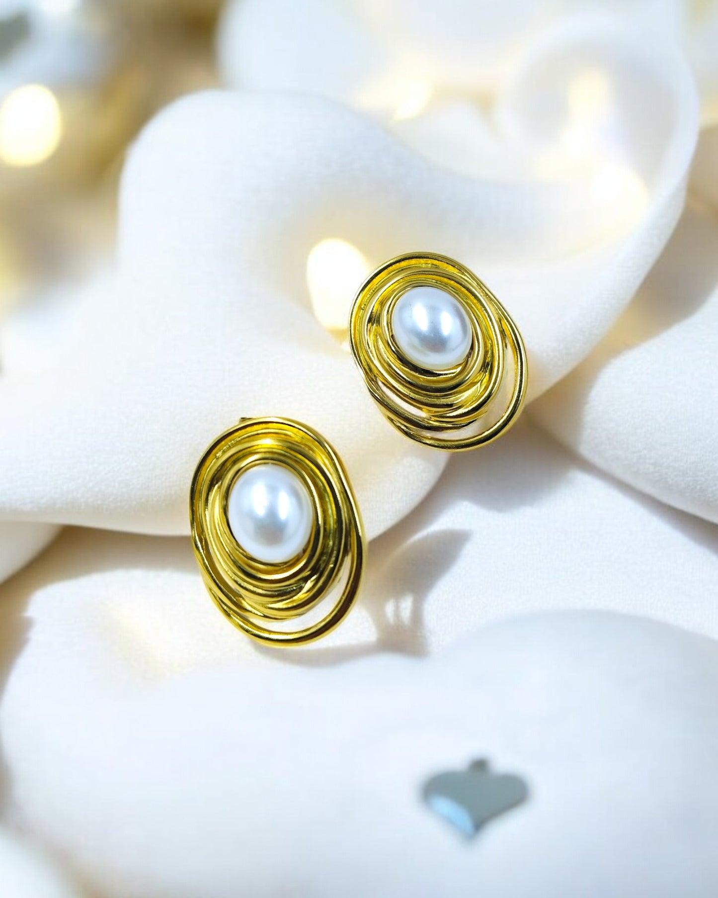 Stylish gold oval earrings with white pearl centerpiece, perfect for bridal, festive, and elegant everyday looks.