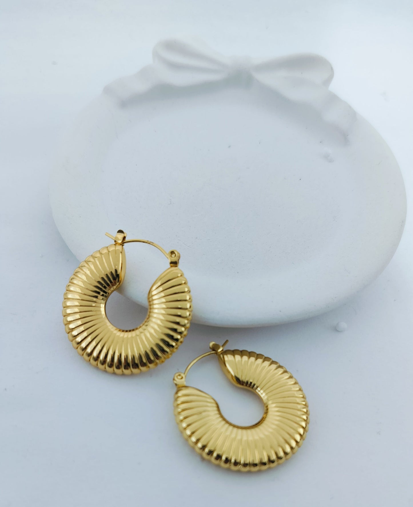 Charming gold hoop earrings with ribbed textured finish, lightweight women’s fashion jewelry gift idea