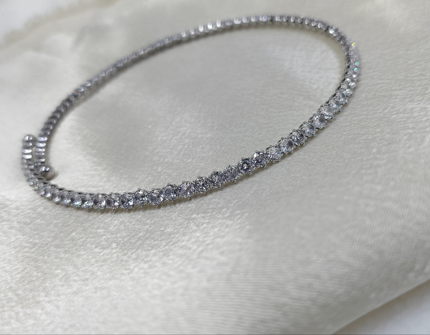 Elegant silver tennis bracelet with sparkling cubic zirconia stones, lightweight anti-tarnish jewelry perfect for party wear.