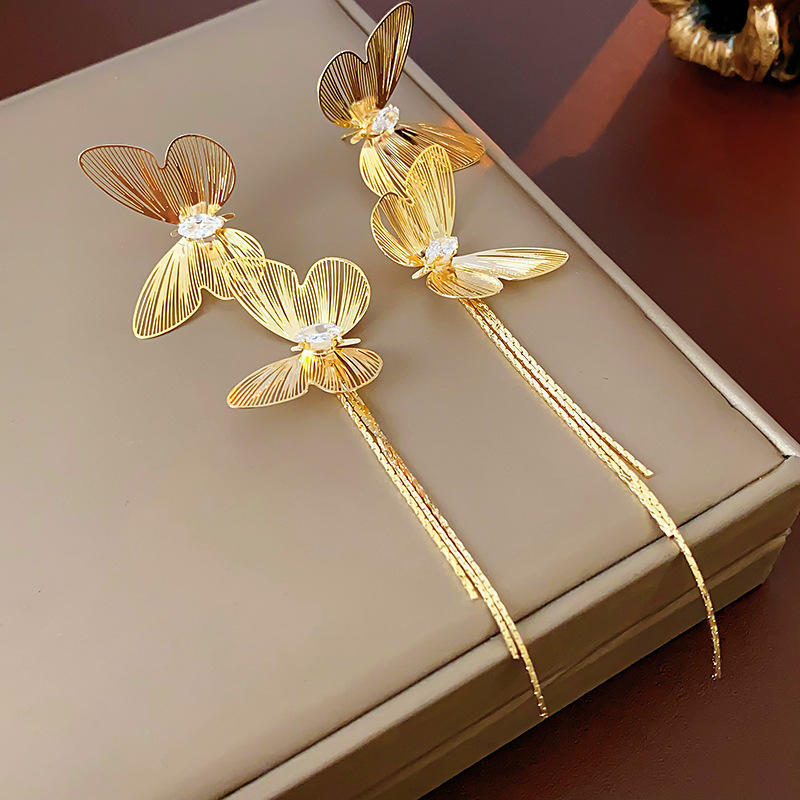 Stylish gold butterfly dangler earrings – anti tarnish long statement jewellery for festive wear, parties & wedding looks