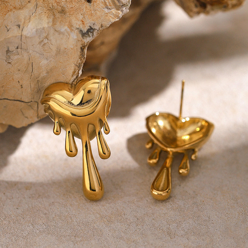 Trendy gold plated melting heart stud earrings for women, unique statement fashion jewellery ideal for parties and daily wear