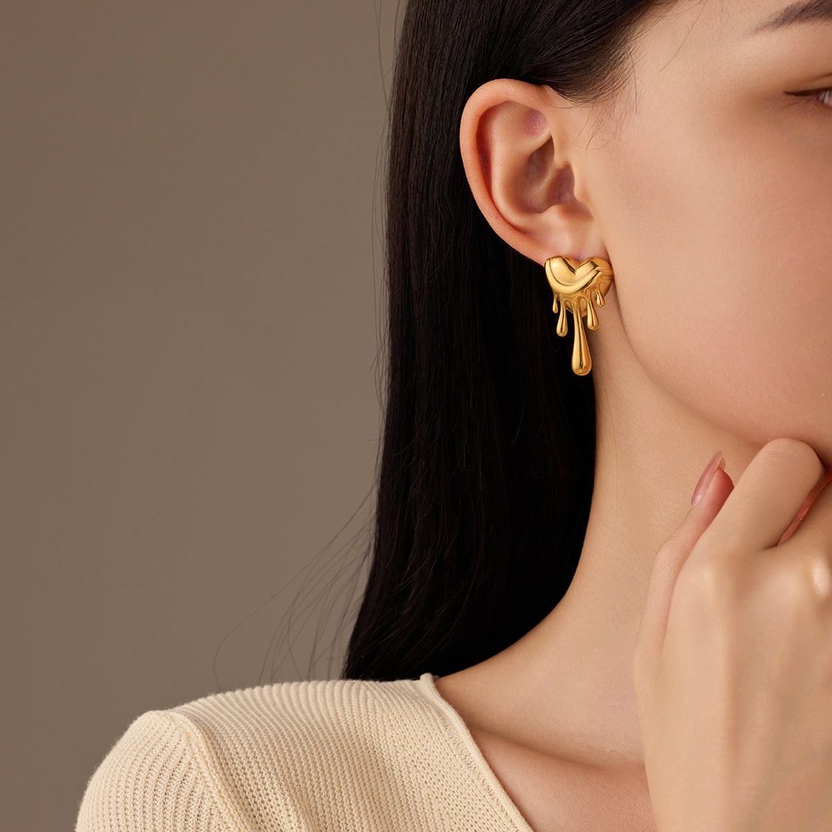 Gold plated melting heart drop earrings for women, unique statement fashion jewellery for parties and daily wear