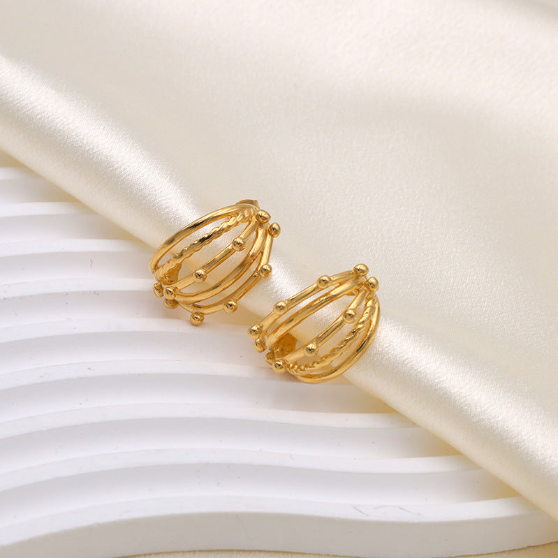 Elegant gold hoop earrings with layered bead detailing, chic jewelry for parties, weddings, and festive occasions