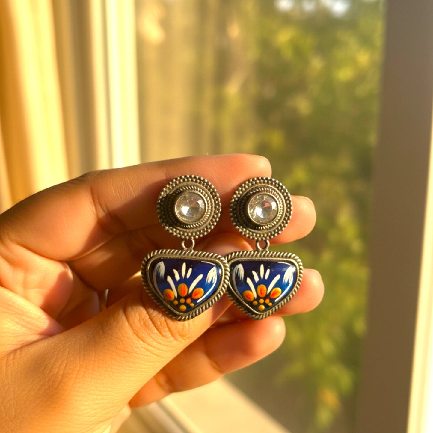 Visvadipti Handpainted Embellished Oxidised Jhumka Statement Earrings