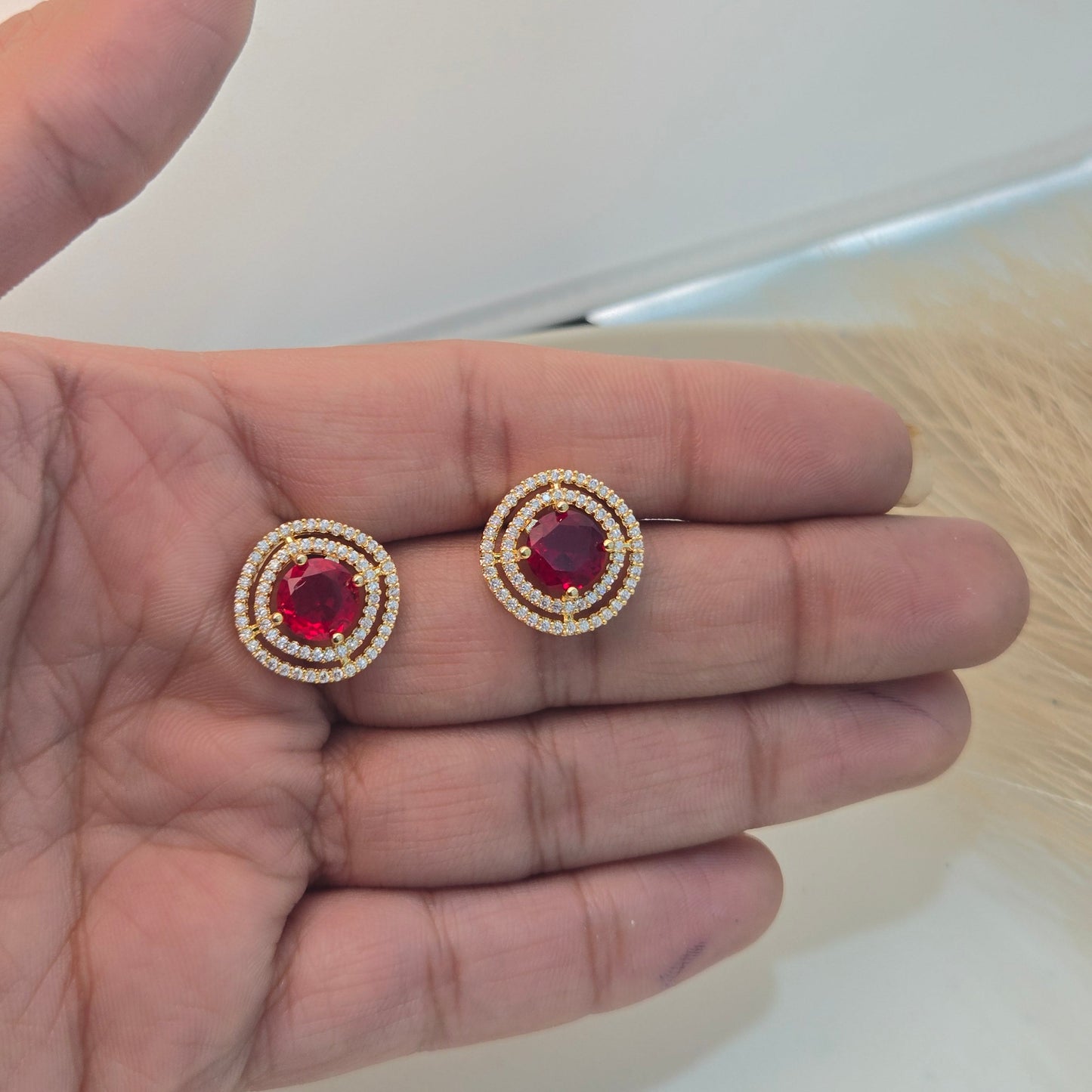 Gilded Ruby-Red Pavé Double Halo Studs