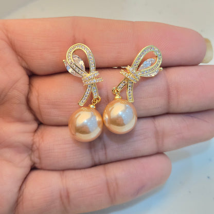 Gilded Coquette Pearl & Pavé Bow Studs