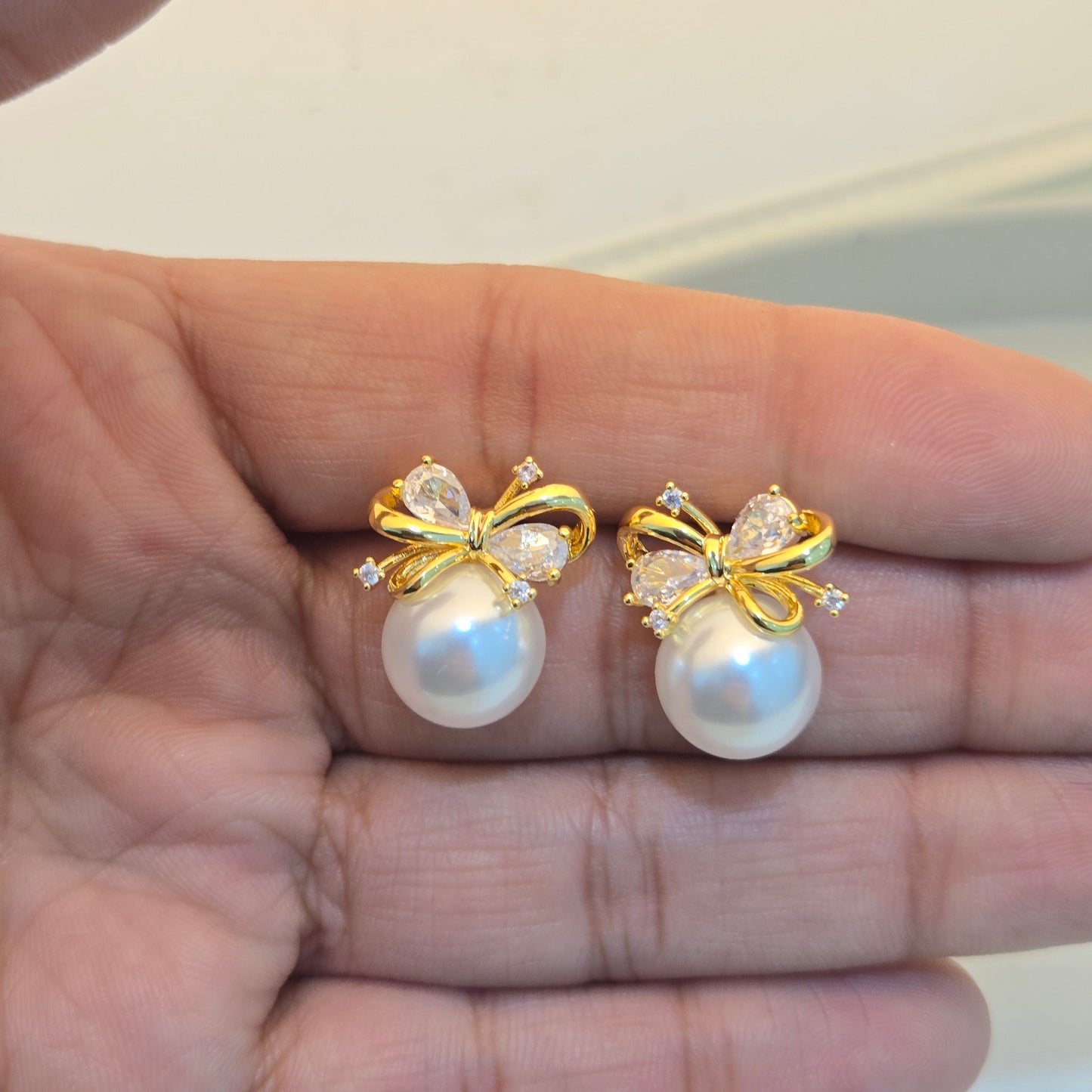 Pearl Bow Crystal Stud Earrings