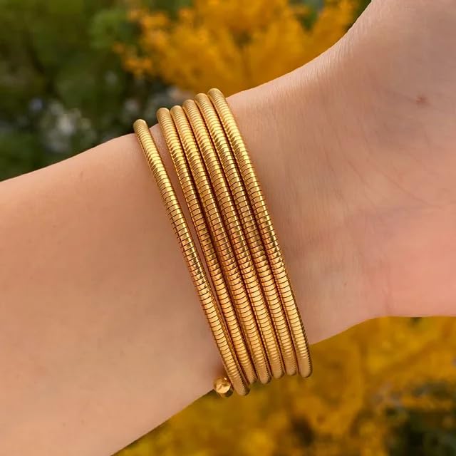 Stylish gold plated spiral bangle – adjustable and comfortable, perfect for adding a chic touch to your everyday wear or party outfits.
