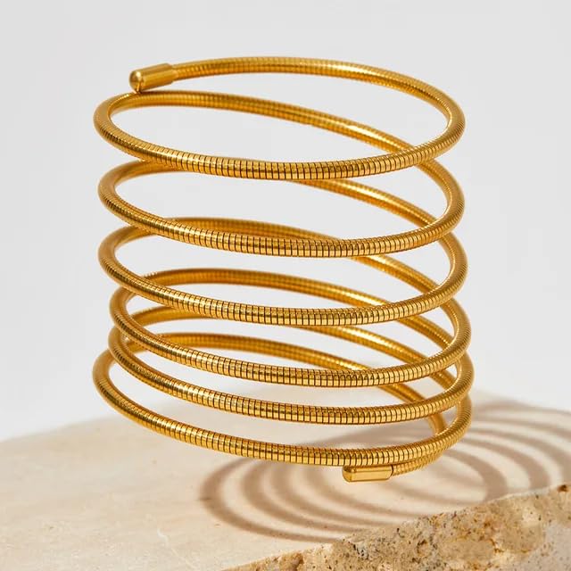 Trendy gold plated spiral cuff bangle – bold, adjustable, and stylish statement jewelry that perfectly complements both party outfits and casual looks.