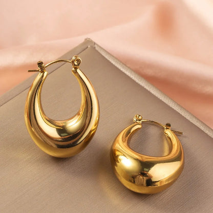 Bold gold chunky hoop earrings for women, modern fashion jewellery perfect for party wear, festive style & gifting.