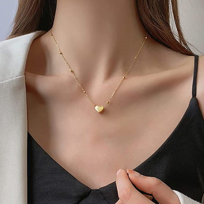 Minimalist gold plated heart pendant necklace for women, elegant lightweight jewelry perfect for daily wear and gifting.