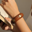 Chunky Polished Wooden Bangle with Gold Disc Inlays