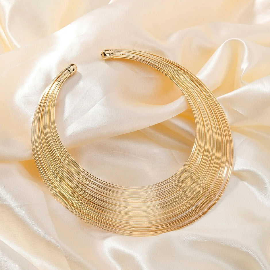 Stylish layered gold plated choker necklace for women on satin fabric – Glampouch jewelry