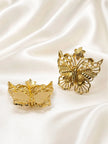 Front and back view of gold butterfly earrings showing push-back closure on satin