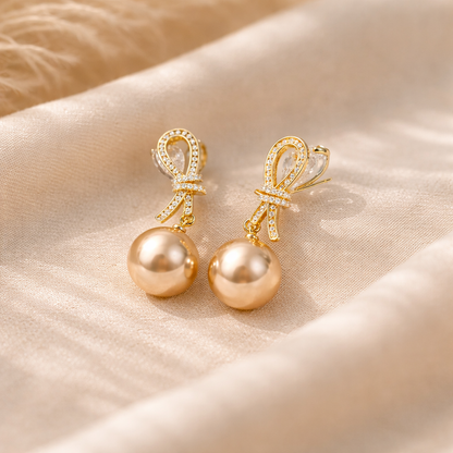 Gilded Coquette Pearl & Pavé Bow Studs
