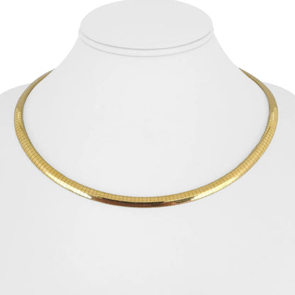 Classic gold choker necklace with flat snake chain design displayed on a white mannequin bust.