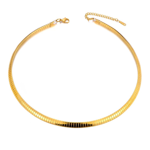 Elegant gold choker necklace with sleek flat design and adjustable chain clasp.