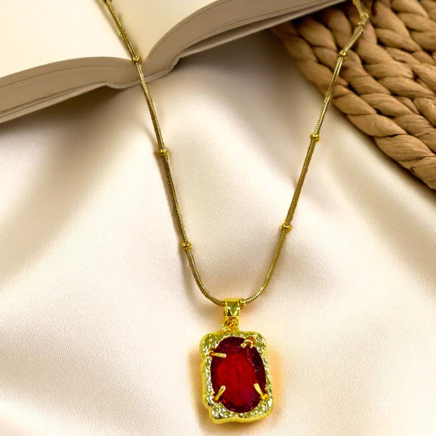 Elegant gold plated necklace with red gemstone pendant for women – Glampouch jewelry