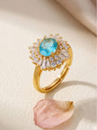 Halo Burst Blue Oval Stone & Baguette Cocktail Statement Ring