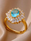 Halo Burst Blue Oval Stone & Baguette Cocktail Statement Ring