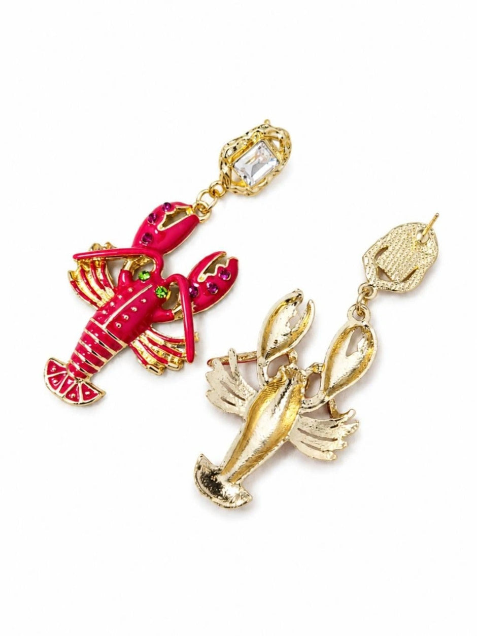 Front and back view of lobster earrings showing fuchsia enamel front and plain gold-toned reverse side