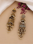 Front and back view of oxidised gold elephant jhumka earrings on beige surface revealing filigree reverse side and push-back stud fitting