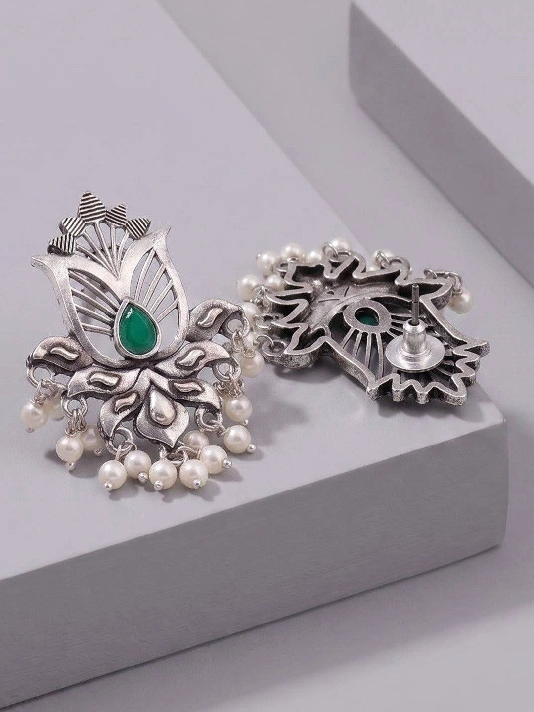 Front and reverse side of oxidised silver lotus earrings showing push-back stud post and pearl drop detail