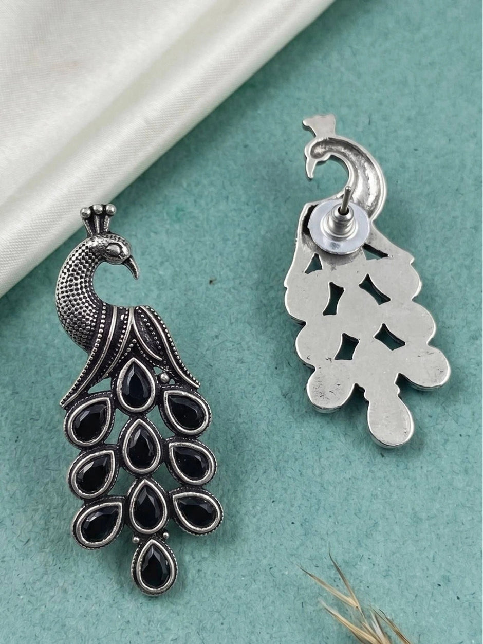 Front and back view of oxidised peacock earring showing stud post and butterfly back