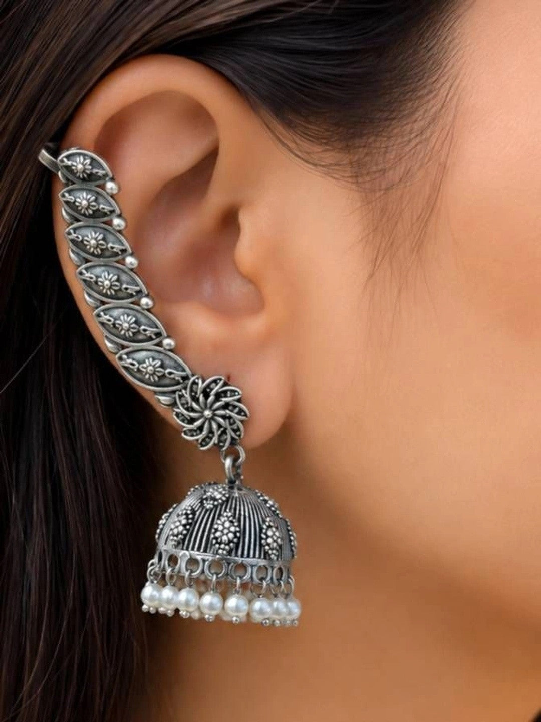 Oxidised silver ear cuff jhumka worn on model showing full ear placement and pearl drops