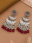 Pair of oxidised silver lotus chandbali earrings laid flat showing front detail