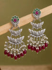 Oxidised silver lotus chandbali earrings displayed on wooden surface showing tiered lotus design