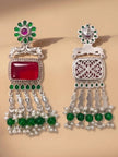 Front and back view of oxidised silver chandbali earrings showing filigree reverse side and stud post