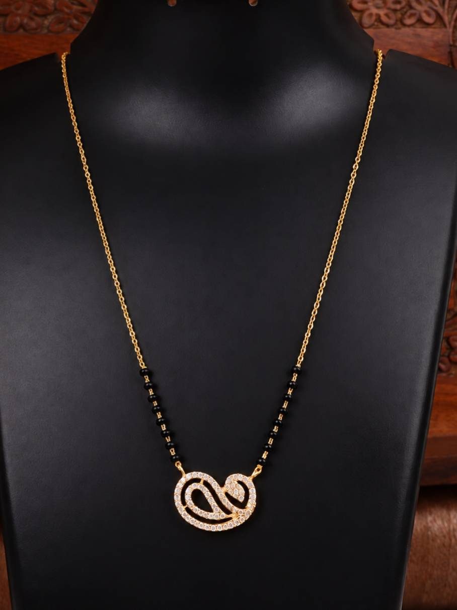 Gold-plated CZ mangalsutra with paisley pendant displayed on a black jewellery bust