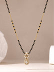 Full-length view of gold-plated black bead mangalsutra with teardrop CZ pendant on neutral background