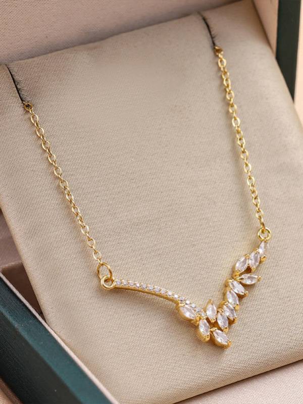 Gold-plated CZ marquise necklace displayed inside a jewellery gift box on beige padding