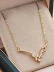 Gold-plated CZ marquise necklace displayed inside a jewellery gift box on beige padding