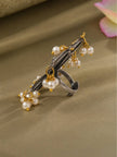 Side profile of oxidised silver floral ring showing pearl drop clusters and gold-tone jump rings on adjustable band