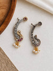 Front and back view of oxidised silver peacock ear cuff earring showing closure and setting detail