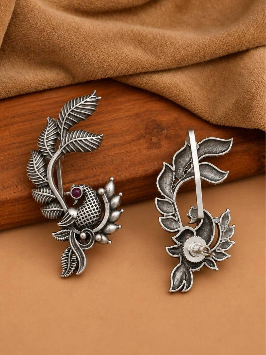 Front and back view of oxidised silver ear cuff earrings showing screw-back closure