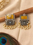 Front and back view of oxidised silver chandbali earrings showing push-back closure and plain reverse side