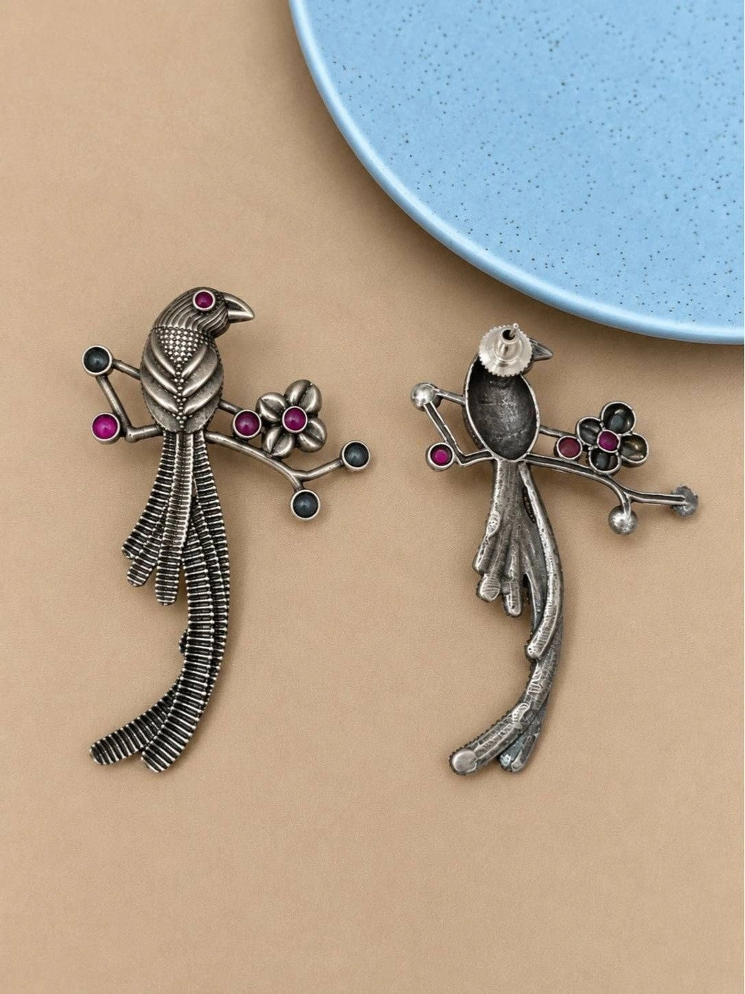 Front and back view of oxidised silver bird earrings showing stud post fastening and reverse detail